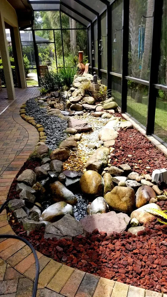Professional landscape installation near you in North Port, FL by Mystic Falls & Ponds