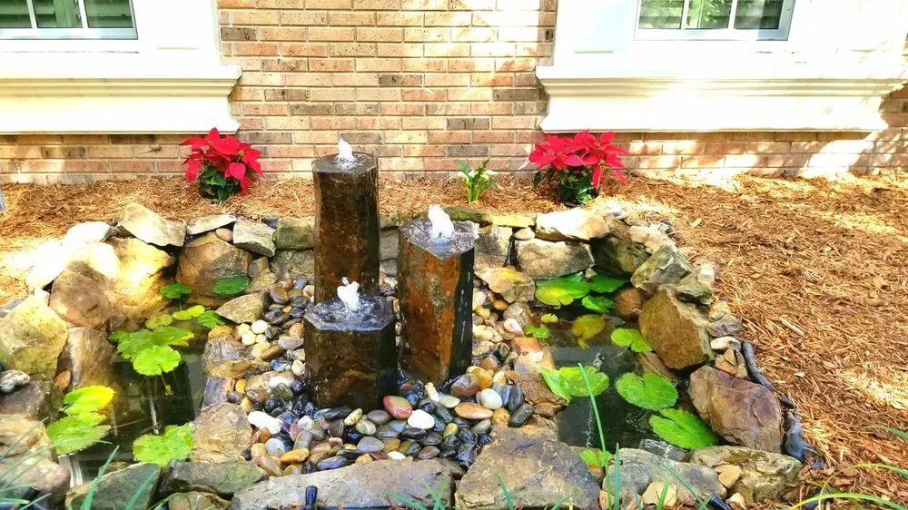 Custom landscape installation with custom design in North Port, FL by Mystic Falls & Ponds