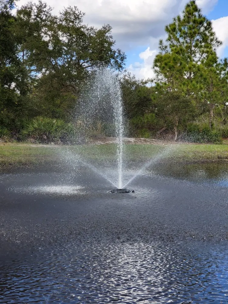Reliable yard maintenance experts serving North Port, FL - Mystic Falls & Ponds