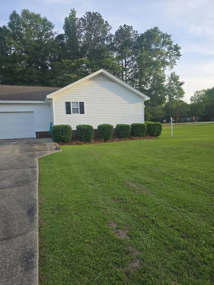 Professional outdoor landscaping in Jackson, AL by Mz. Daisy's Lawn Care