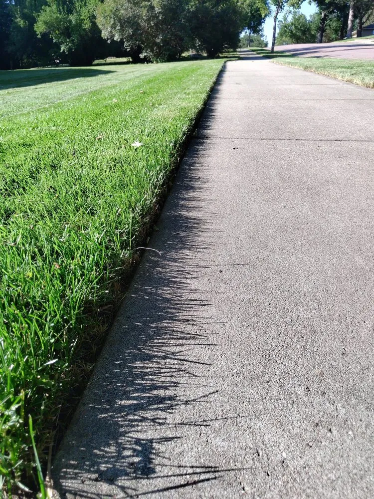 Expert outdoor landscaping for residential properties in Sioux Falls, SD by MZL Lawncare