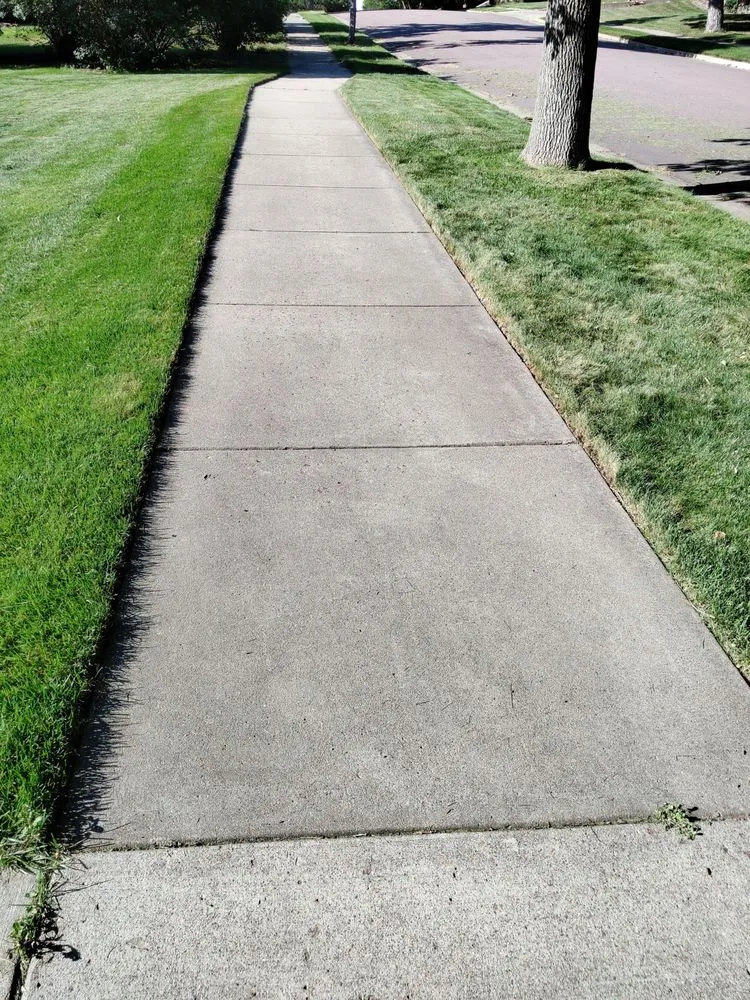 Custom residential landscaping for beautiful yards in Sioux Falls, SD by MZL Lawncare