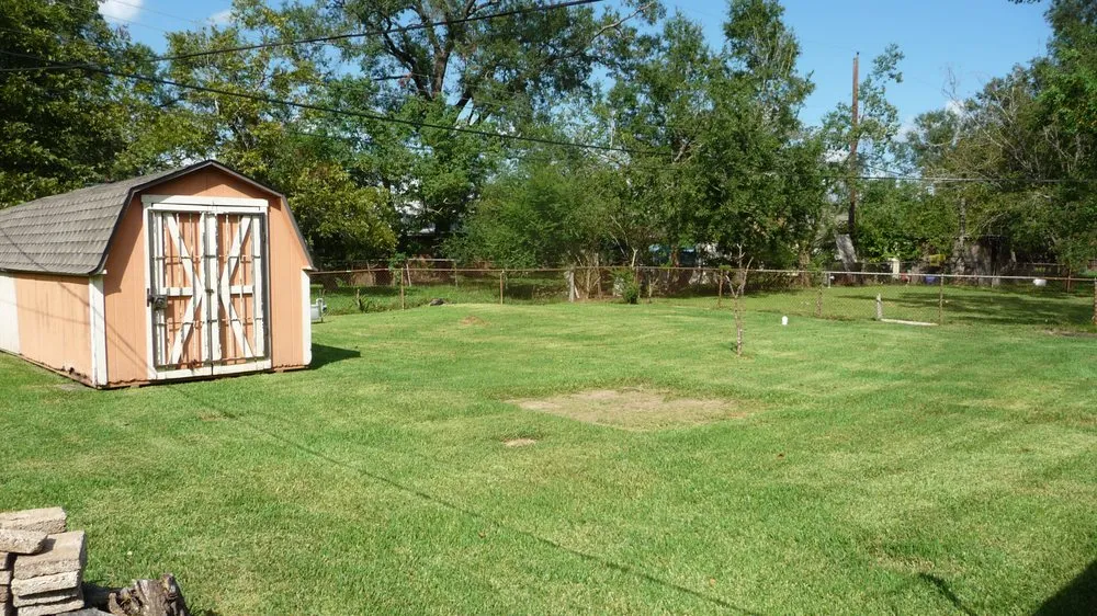 Custom landscape design for beautiful yards in Houston, TX by N-ER Flash Lawn Care