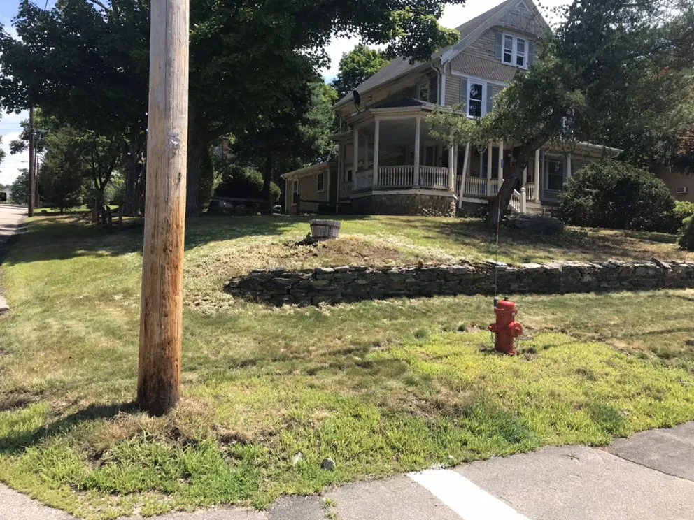 Custom yard cleanup service with custom design in Stoughton, MA by N Friends Landscape