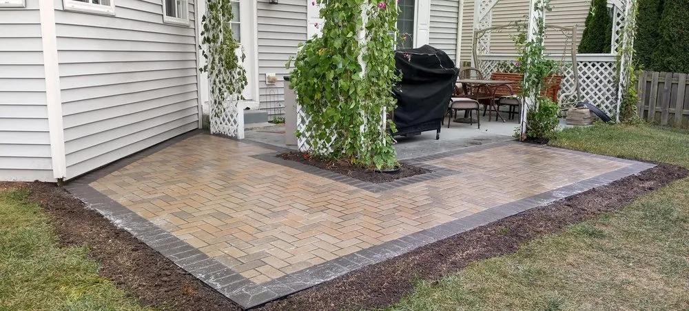 Custom garden landscaping with custom design in Sandwich, IL by Nachos Lawn Care
