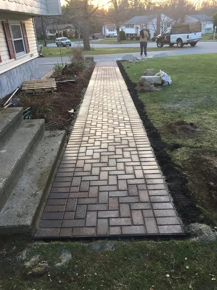 Top-rated lawn mowing service with custom design across Framingham, MA - Nalon & Son Landscaping and Cleaning Services