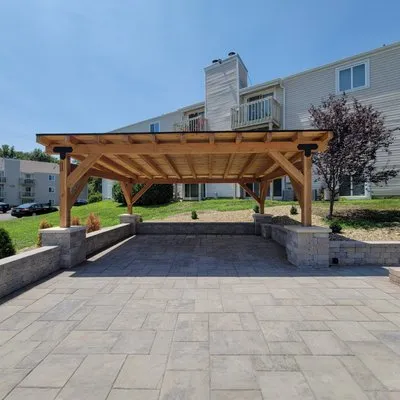 Naly's Lawn & Landscape Logo