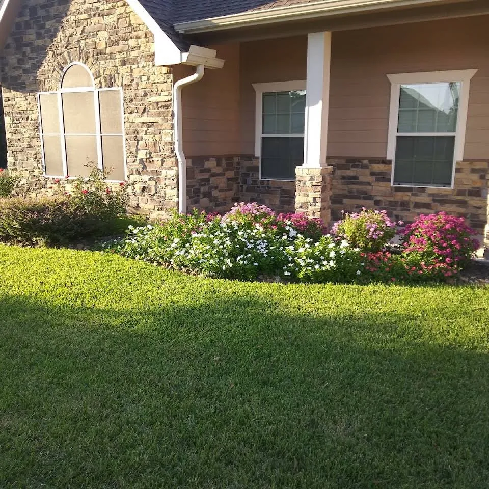 Reliable lawn mowing service for year-round maintenance in Willis, TX by Name Your Price Affordable Lawn Care