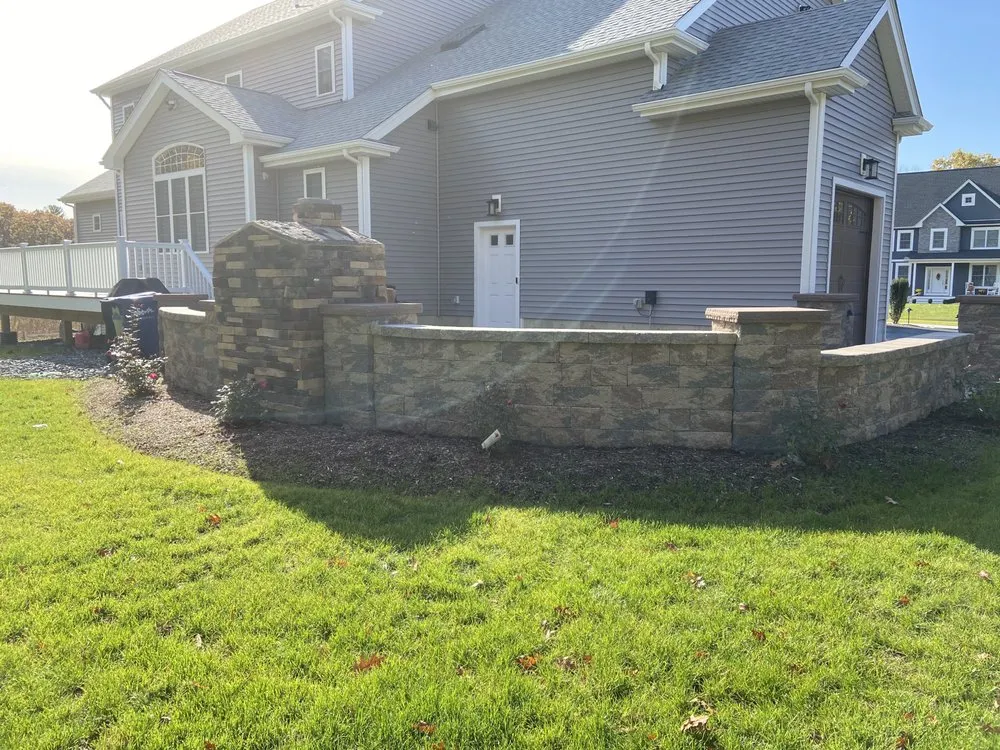Professional landscape installation with custom design in Lincoln, RI by Nassaney Brothers Landscaping
