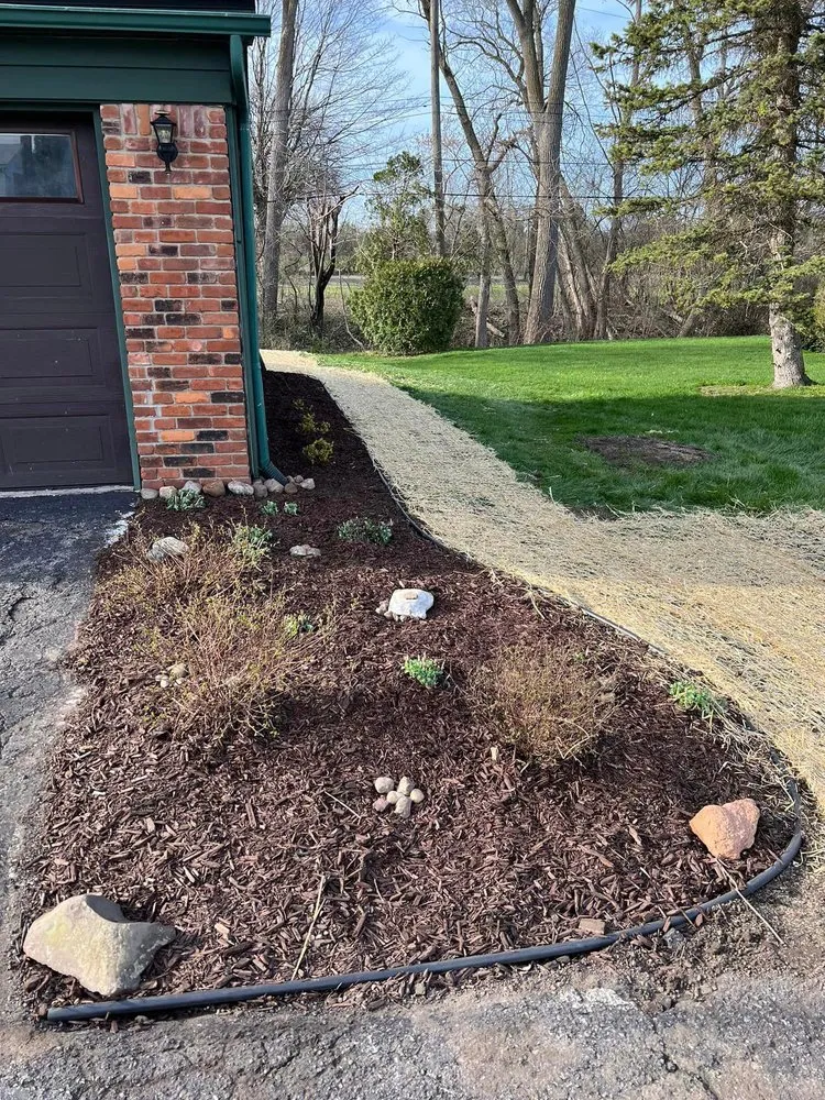 Custom landscape design for outdoor upgrades in Livonia, MI by Nate's Outdoor Services