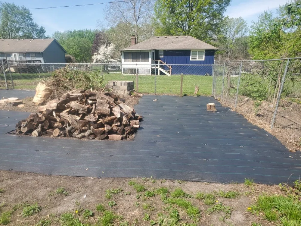 Affordable landscape installation for beautiful yards in Independence, MO by Nathan & Ashlie's Monkey Services