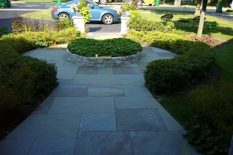 Custom garden landscaping for year-round maintenance in Highland Park, IL by National Brick Pavers & Stone Co.