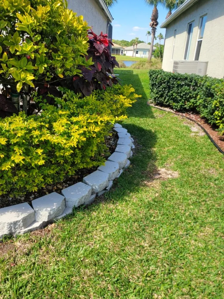 Custom landscape installation for residential properties across port st lucie, FL - Native Control Services