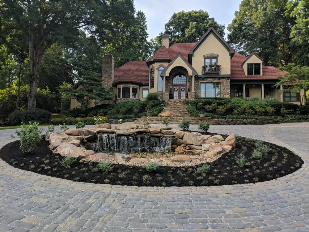 Custom yard maintenance with custom design in Louisville, TN by Native Design & Hardscape