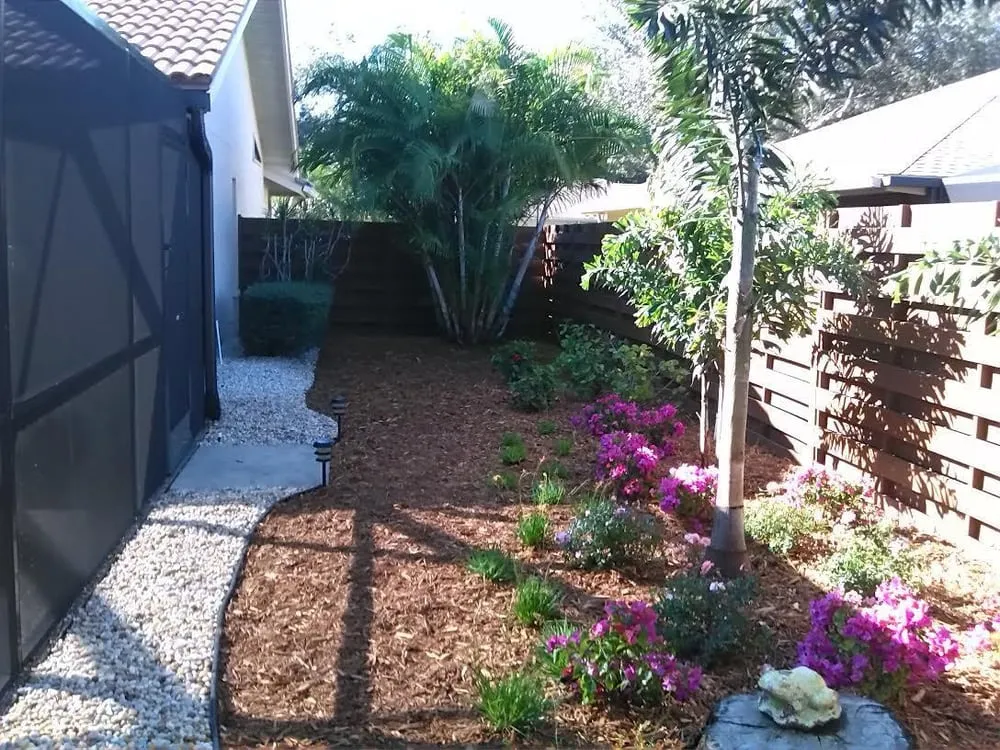Custom garden landscaping for year-round maintenance in Sarasota, FL by Native Son Landscaping