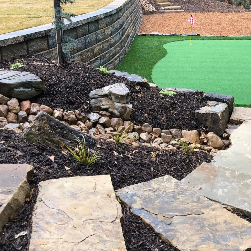 Custom garden landscaping for beautiful yards in Kennesaw, GA by Natural Creations Landscape and Design