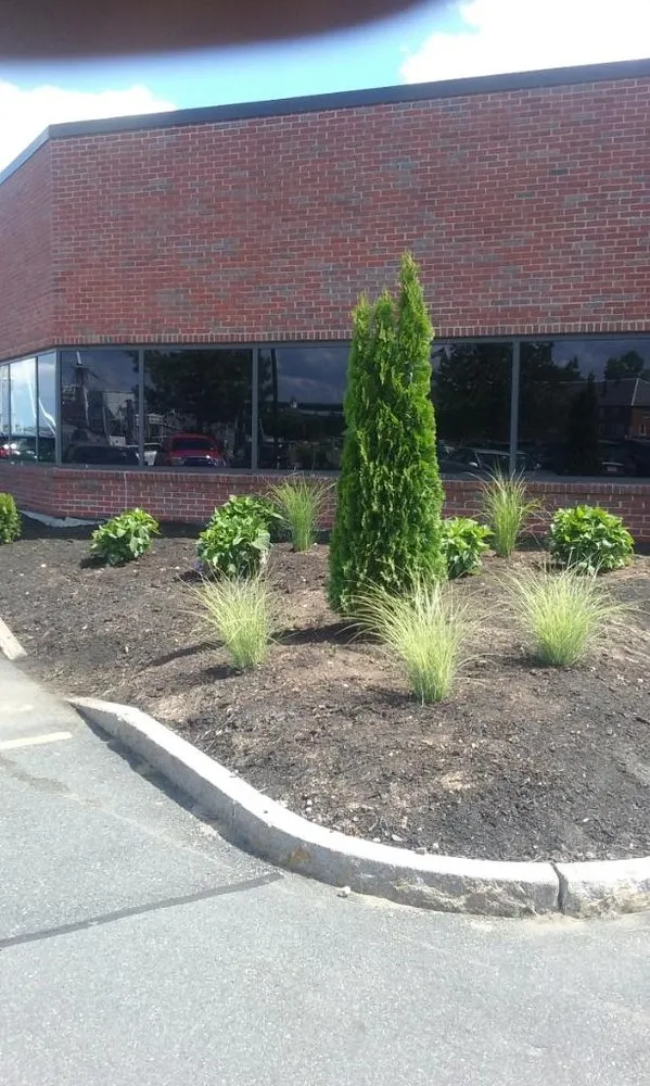 Professional outdoor landscaping for beautiful yards across Woburn, MA - Natural Landscape & Masonry