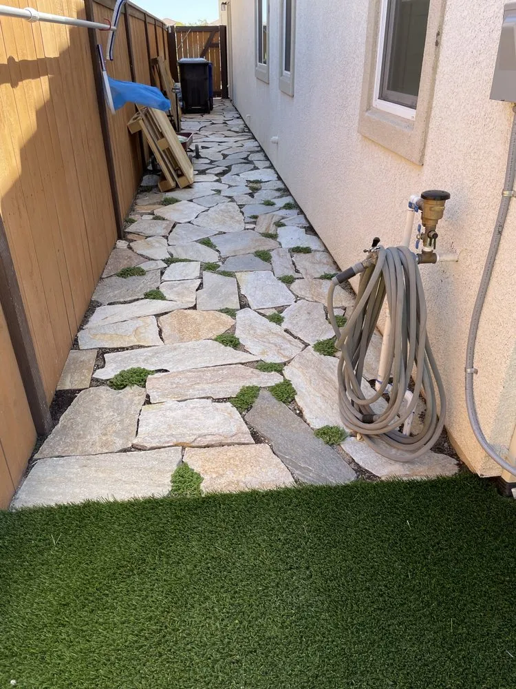 Custom lawn mowing service for outdoor upgrades in Modesto, CA by Natural Landscaping