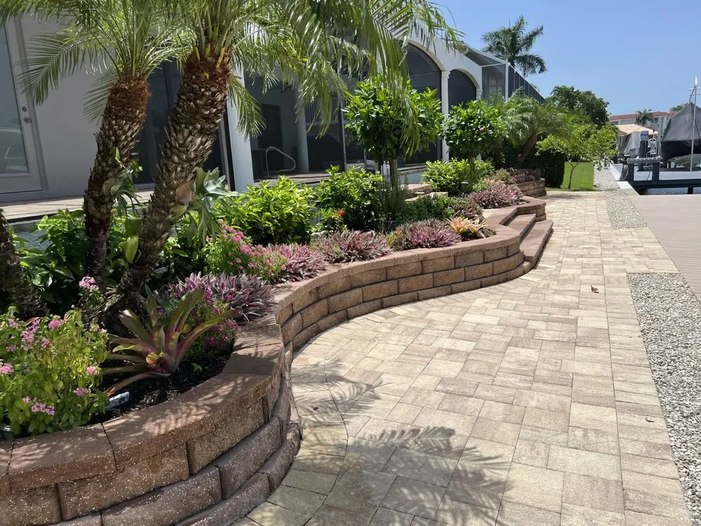Local landscape installation for year-round maintenance in Naples, FL by Natural lawn Maintenance
