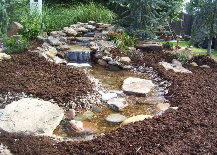 Expert landscaping services in Tuttle, OK by Natural Look Water Features