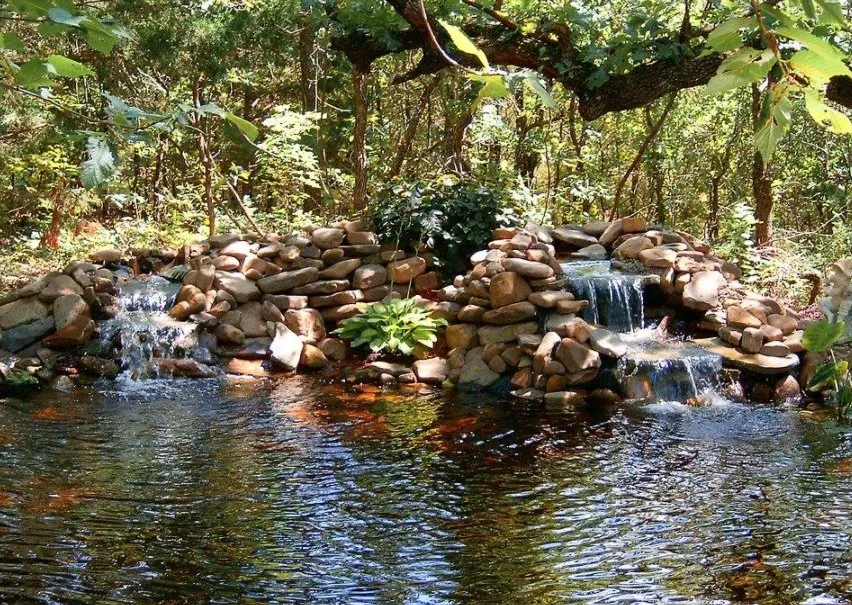 Custom outdoor landscaping in Tuttle, OK by Natural Look Water Features