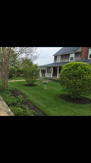 Professional outdoor landscaping for year-round maintenance in Hampton Bays, NY by Natural Maple Landscaping