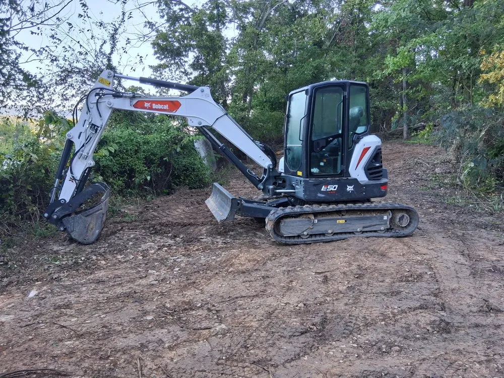 Local yard maintenance in Rogers, AR by Natural State Curbing