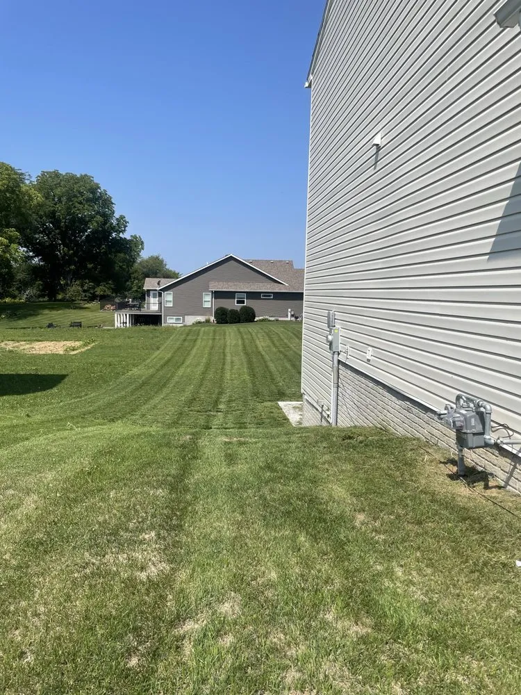 Trusted lawn care service near you in Davenport, IA by Natural Terrains