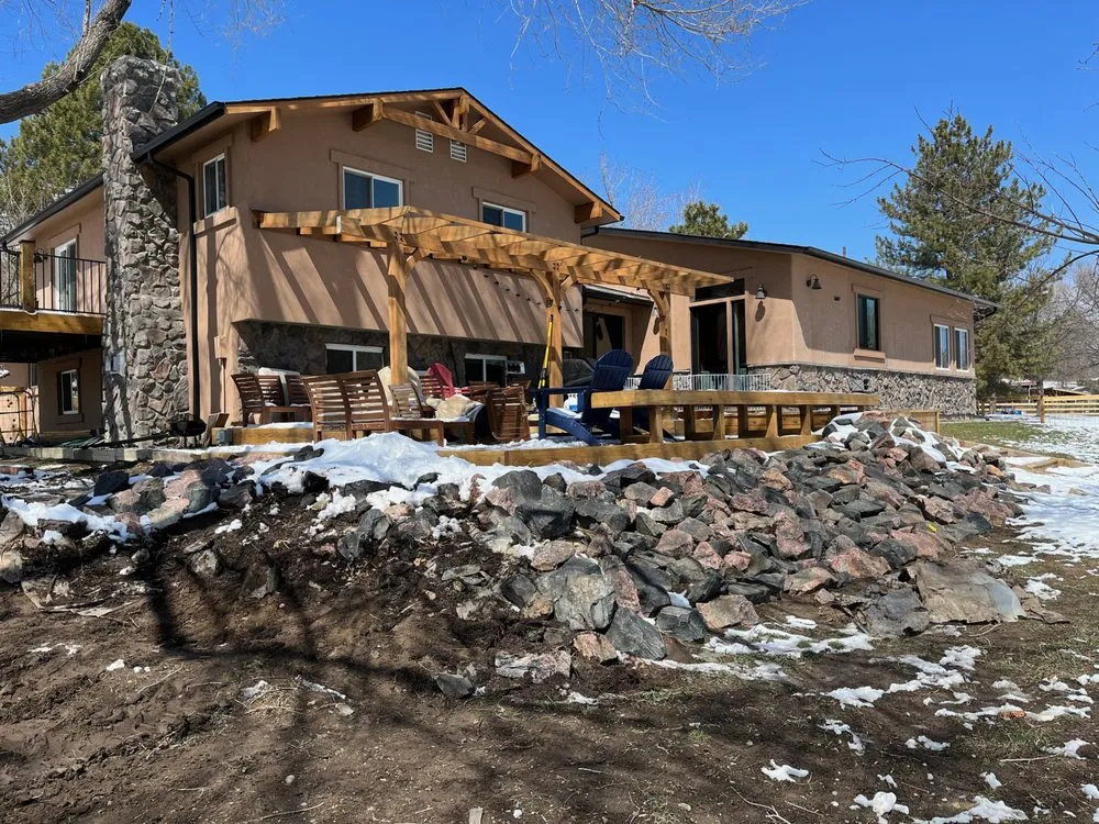 Professional yard maintenance for residential properties in Longmont, CO by Natural Touch Services