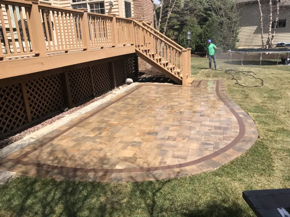 Affordable landscape design for year-round maintenance in Oswego, IL by Natural World Landscaping