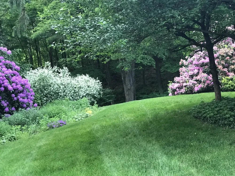 Custom garden landscaping for year-round maintenance in Newtown, CT by NaturaLawn of America