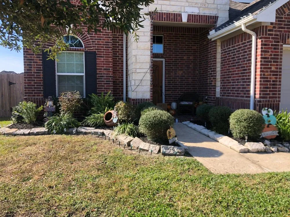 Professional landscaping services for beautiful yards in Houston, TX by Nature By Design Landscape