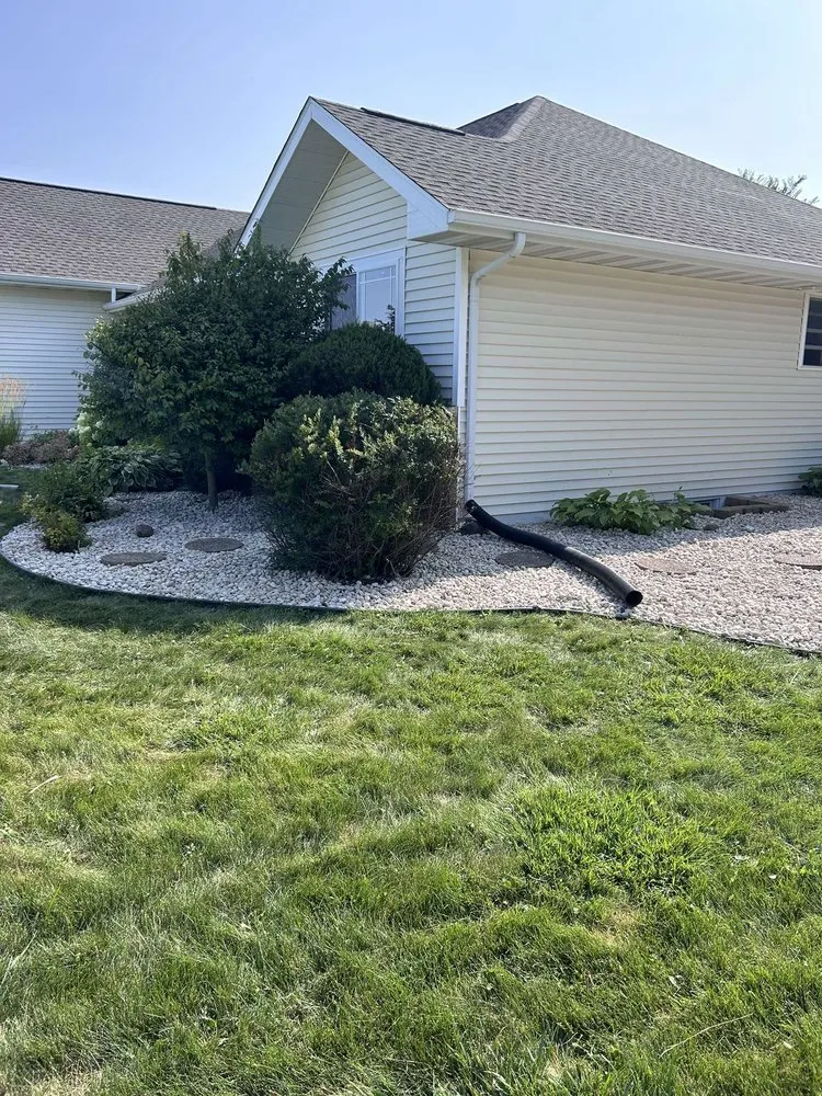 Custom landscape installation for homes across De Pere, WI - Nature Edge Landscaping
