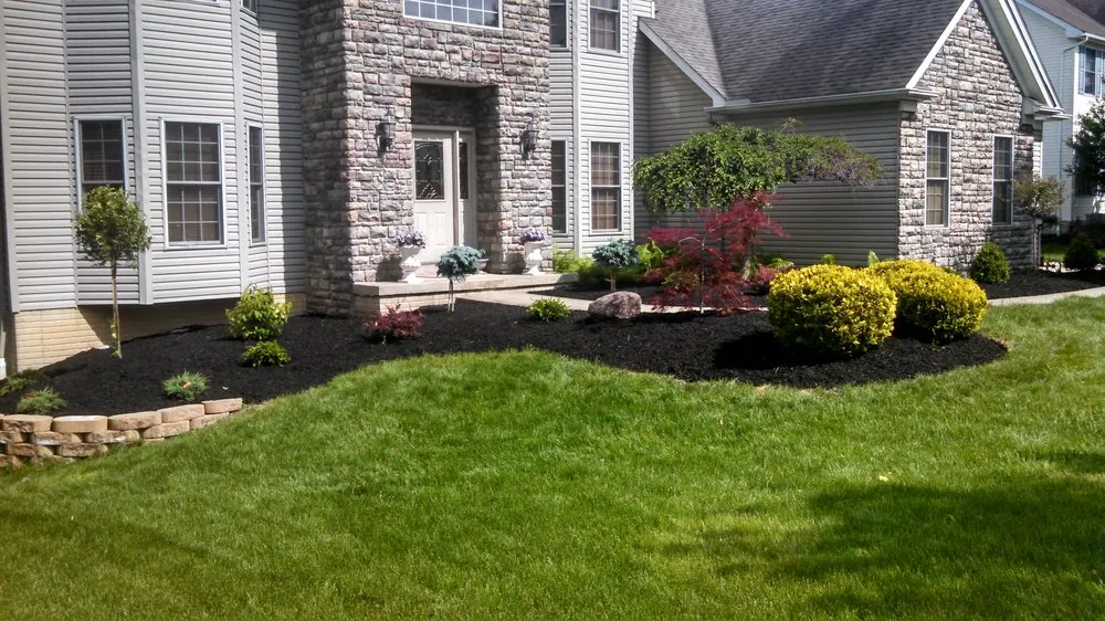 Custom residential landscaping in Parma, OH by Nature In Bloom