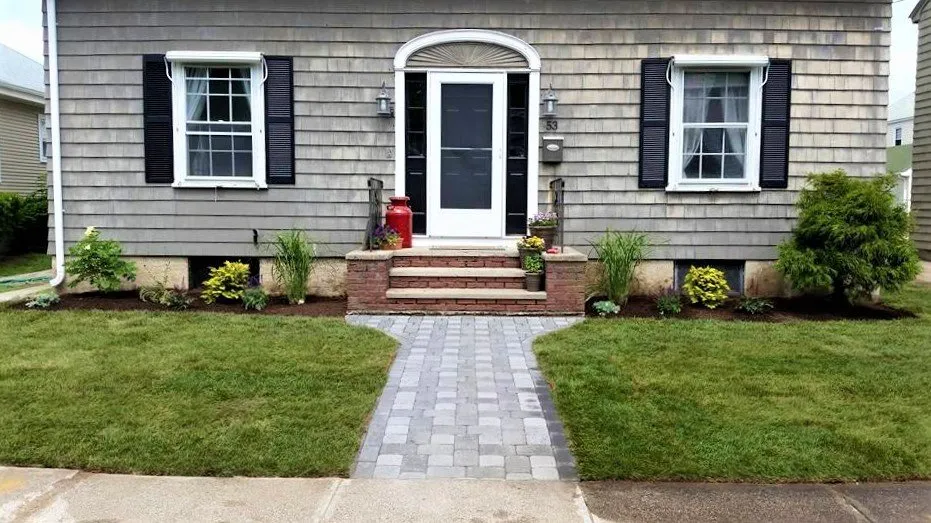 Professional lawn mowing service in Warwick, RI by Nature Redesigned Landscaping