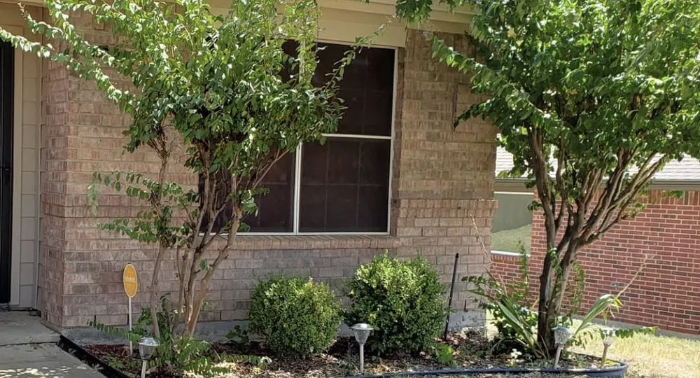 Custom outdoor landscaping for residential properties across Fort Worth, TX - Nature’s Barber Tx