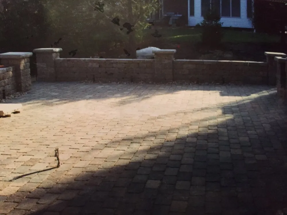 Top-rated lawn mowing service for residential properties in Troy, IL by Nature's Design