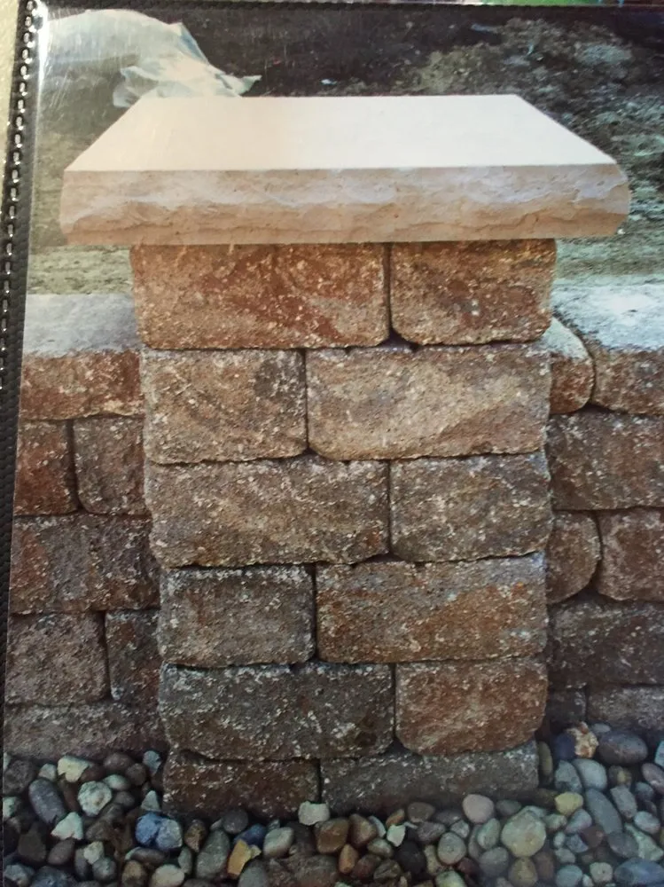 Trusted lawn mowing service for residential properties in Troy, IL by Nature's Design