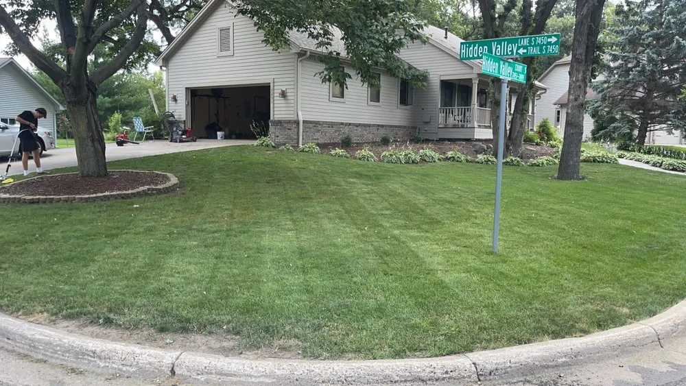 Professional lawn mowing service for beautiful yards across Cottage Grove, MN - Natures Edge Landscaping