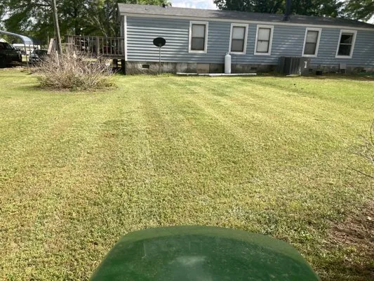 Natures Edge Lawn And Landscape Logo