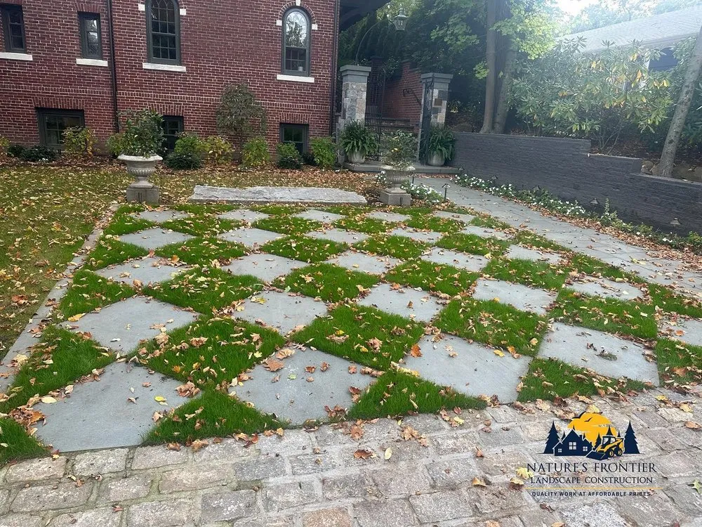 Professional landscaping services for year-round maintenance across East Providence, RI - Nature's Frontier Landscaping & Construction