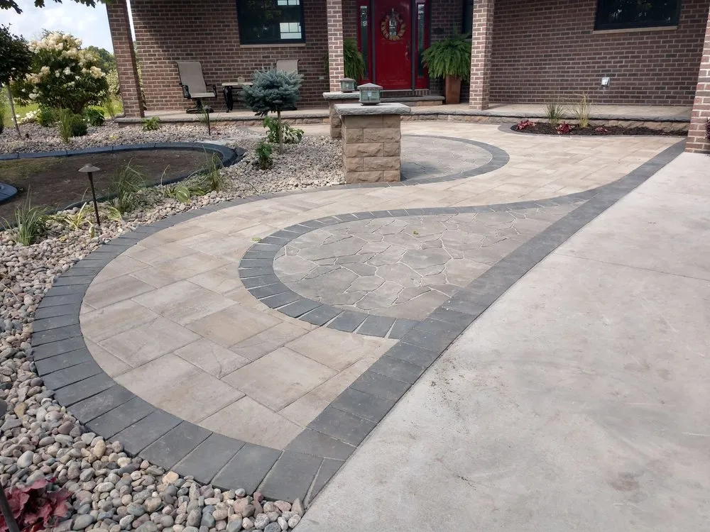 Custom landscape design for year-round maintenance in Hastings, MN by Nature's Quest Landscape & Design