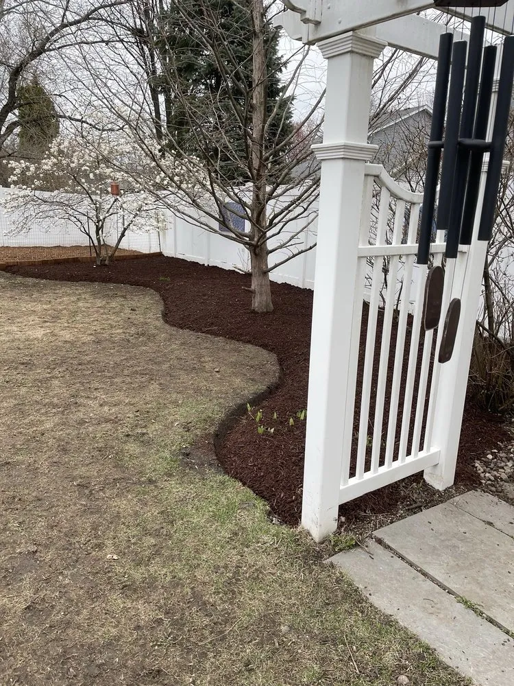 Local yard cleanup service for year-round maintenance in Aurora, IL by Nature’s Touch Landscaping