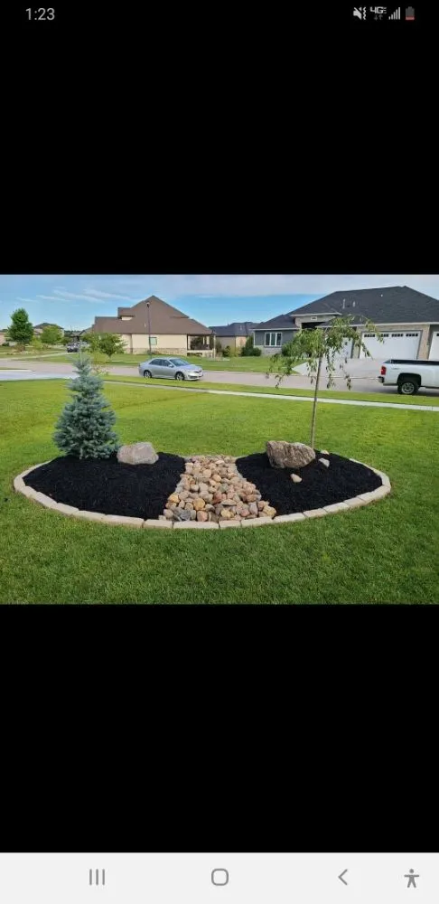 Custom outdoor landscaping in Elkhorn, NE by Nature’s Touch Lawn & Landscaping