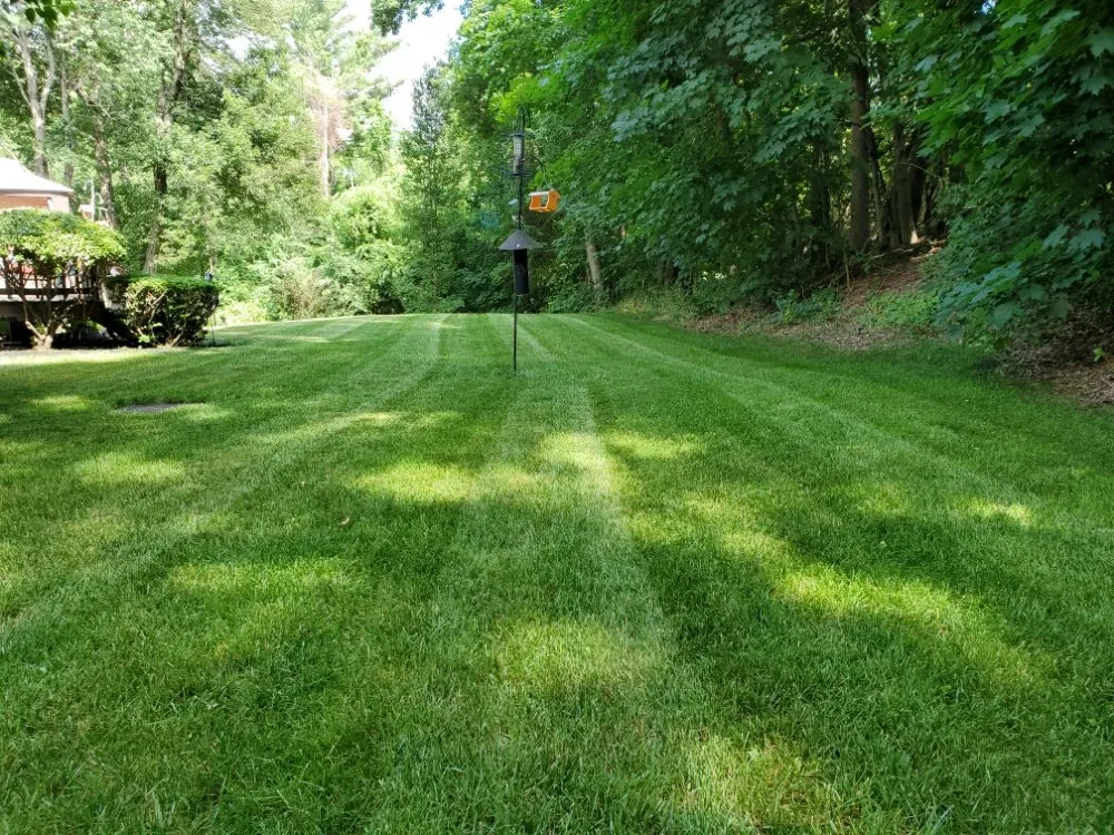 Reliable lawn mowing service for beautiful yards in Orange, MA by Nautical Landscape