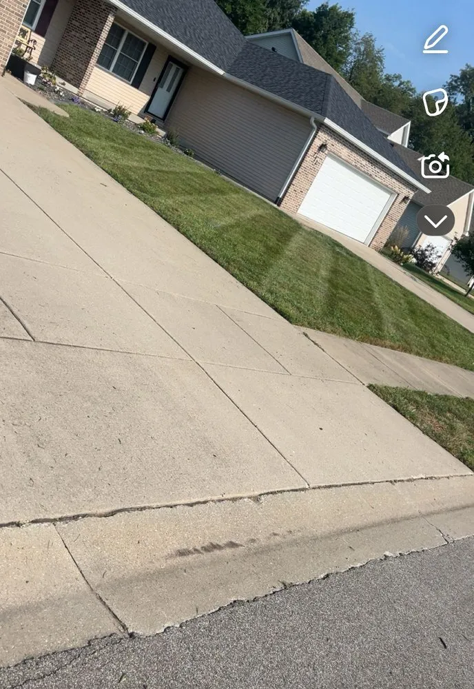 Custom landscape design for year-round maintenance in Sherman, IL by NC Lawn Pros