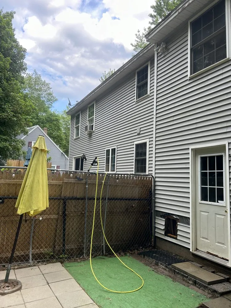 Professional yard cleanup service for residential properties across Portland, ME - N&E Property Services