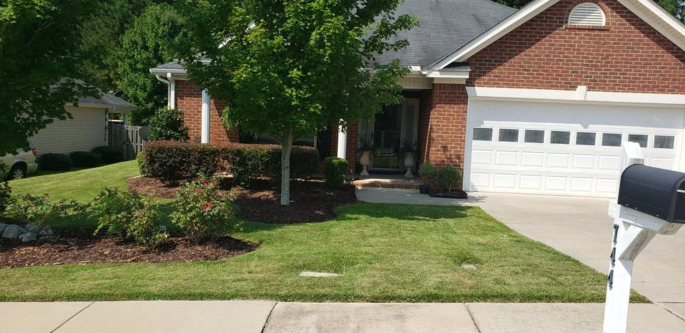 Custom landscape installation for residential properties in Evans, GA by Neal's Landscaping And Lawncare