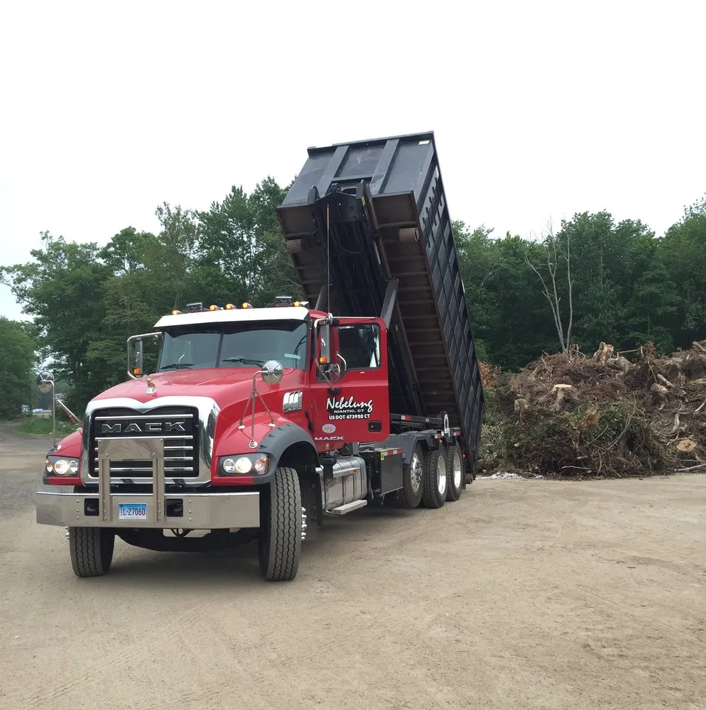Expert yard cleanup service for residential properties across Niantic, CT - Nebelung Construction - Dumpsters and Property Services