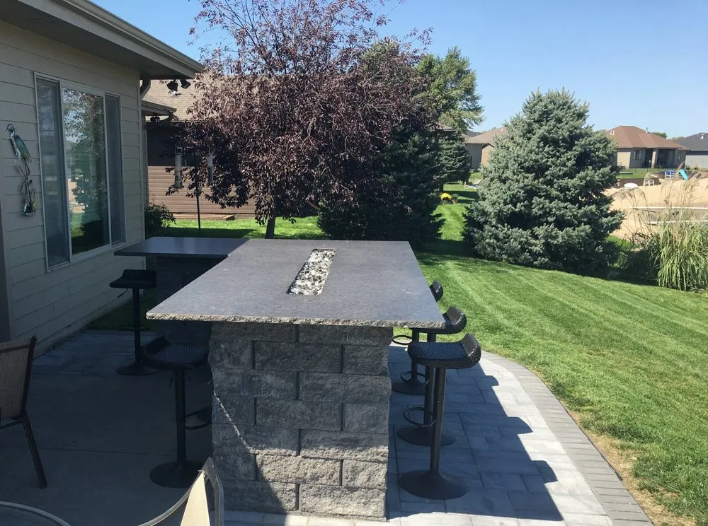 Professional yard cleanup service with custom design in Valley, NE by Nebraska Outdoor Solutions